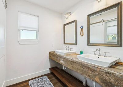 Bright and clean full bathroom with modern fixtures and soft towels